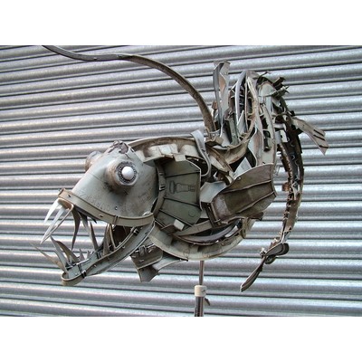 Image for: Made from old car hubcaps/wheel trims