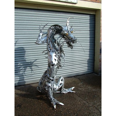 Image for: Made from old car hubcaps/wheel trims