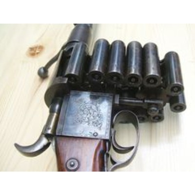 Image for: Treeby Chain Gun 14-shot rifle from 1854 very steam punk!